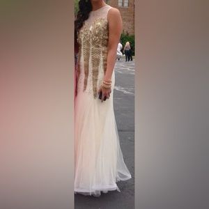 Pale yellow gown with stone and embroidery work. For prom and desi functions
